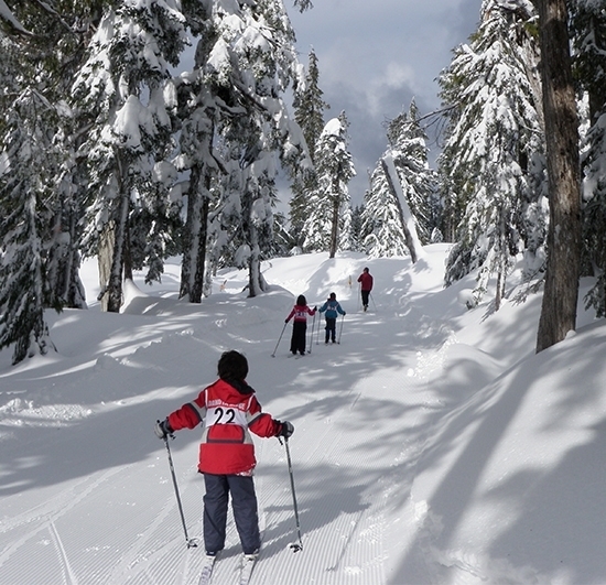 Photo of girl cross country skiing at Dakota Ridge.