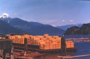 Barge entering hillside industrial area