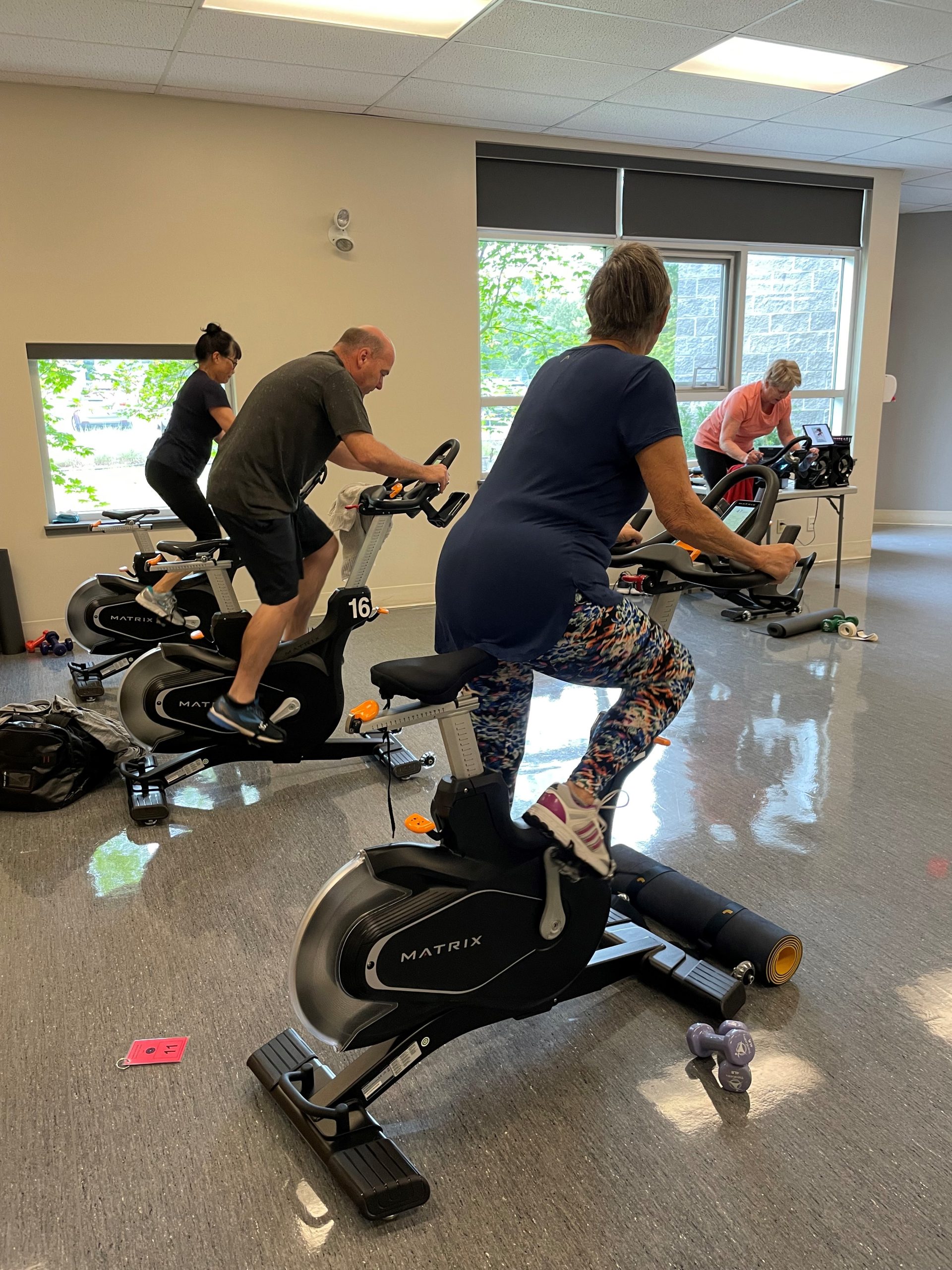 people taking part in a spin class