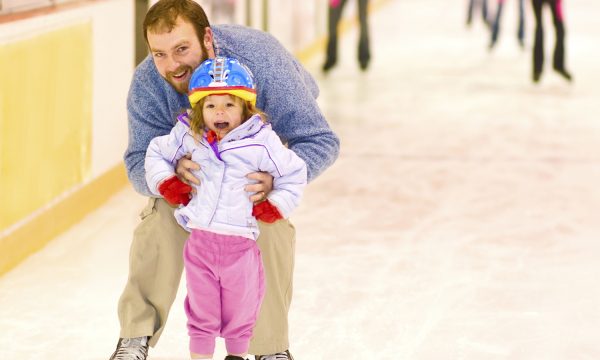 Father and Daughter at Ice Skating Rink