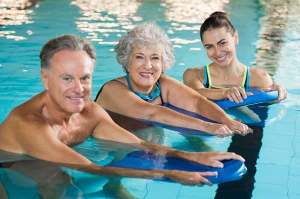 Active seniors at water fitness
